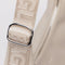 up close of silver buckle of stone leather medium crescent bag