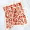cream tea towel with pink and red sardine can print