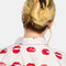 model wearing double sided hair claw: translucent brown with black dashes and lime green/yellow reverse side