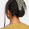 model wearing black and white checkered large nimbus hair claw