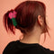 model wearing pink flower bouquet hair claw