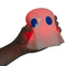 model squeezing lit PAC-MAN color changing mood light