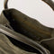 interior of dark olive suede small handbag with piped handles
