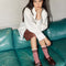 model wearing red and white marled knee high socks with double burgundy stripe top and white ruffles