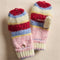 cream. red, blue and pink striped gloves/mittens folded up
