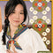 model wearing navy square bandana with 70's folk print