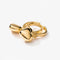 up close of gold hoop earrings with detachable dainty heart charm
