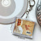 back of Christina Aguilera mini CD keychain
