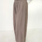 sideview of model wearing mushroom cotton wide leg pants with side inlets