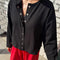 model wearing black snap front cotton cardigan
