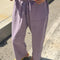 model wearing dried lavender carpenter  cotton pants