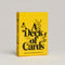 yellow card deck box that says 'A DECK OF CARDS, brought to you by LE PUZZ puzzles and F.U.N inc.'