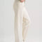 side view of model wearing vintage white relaxed fit straight leg jean