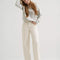 model wearing vintage white relaxed fit straight leg jean