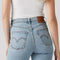 up close of back of light wash ribcage straight ankle jeans