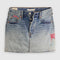 medium sand wash mini skirt with colorful patches on the pocket and side