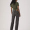 back view of model wearing black wash relaxed straight leg jeans