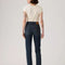 back view of model wearing dark denim wedgie slim fit jeans