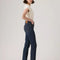 side view of model wearing dark denim wedgie slim fit jeans