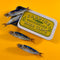 set of two blue sardine hair barrettes and comes in a tin holder