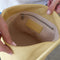 cream interior of pale yellow leather bucket bag