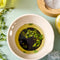 cream colored peel, grate, and herb stem remover bowl