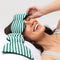 model wearing cabana green and white stripe weighted eye mask