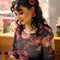 model wearing red large button earrings and matching hair clips