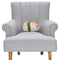 throw pillow shaped as shrimp sushi on a chair