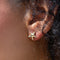 model wearing silver starfish stud earrings