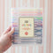 model holding packaged set of 30 glitter, metallic, pastel, neon and primary gel pens