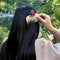 model using cream pocket comb with teddy bear holding a red heart on the top