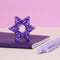 various shades of purple mini magnet fidget toy in a star design