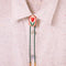model wearing red tulip bolo tie with green cord and gold tips