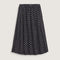 black skirt with white polka dot print