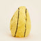 side view of yellow smiley face heating plush