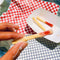 model holding fry of french fry shaped hand soap
