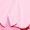 button closure of light pink tree skirt with red velvet bows and red scalloped trim