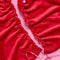 red velvet cinched tree skirt with red satin bows