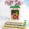 ceramic vase in the shape of wildflowers seed packet with flowers inside