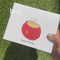 model showcasing red apple planter