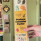 model hanging the produce calendar poster