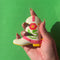 model squeezing various de-stress balls