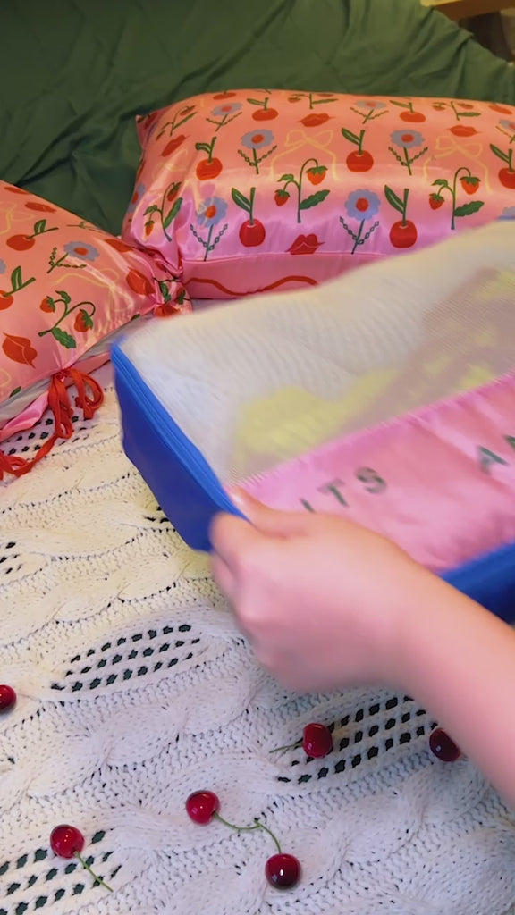model using set of 4 packing cubes: silly little things,  sweet little things, bobs and things, and bits and bobs