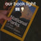 model showing how 'do not disturb' booklight