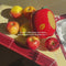model putting an apple in red apple planter