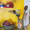 model showcasing orange juice carton and orange salt and pepper shakers